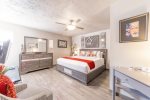 Bedroom 2 features a contemporary world travel design